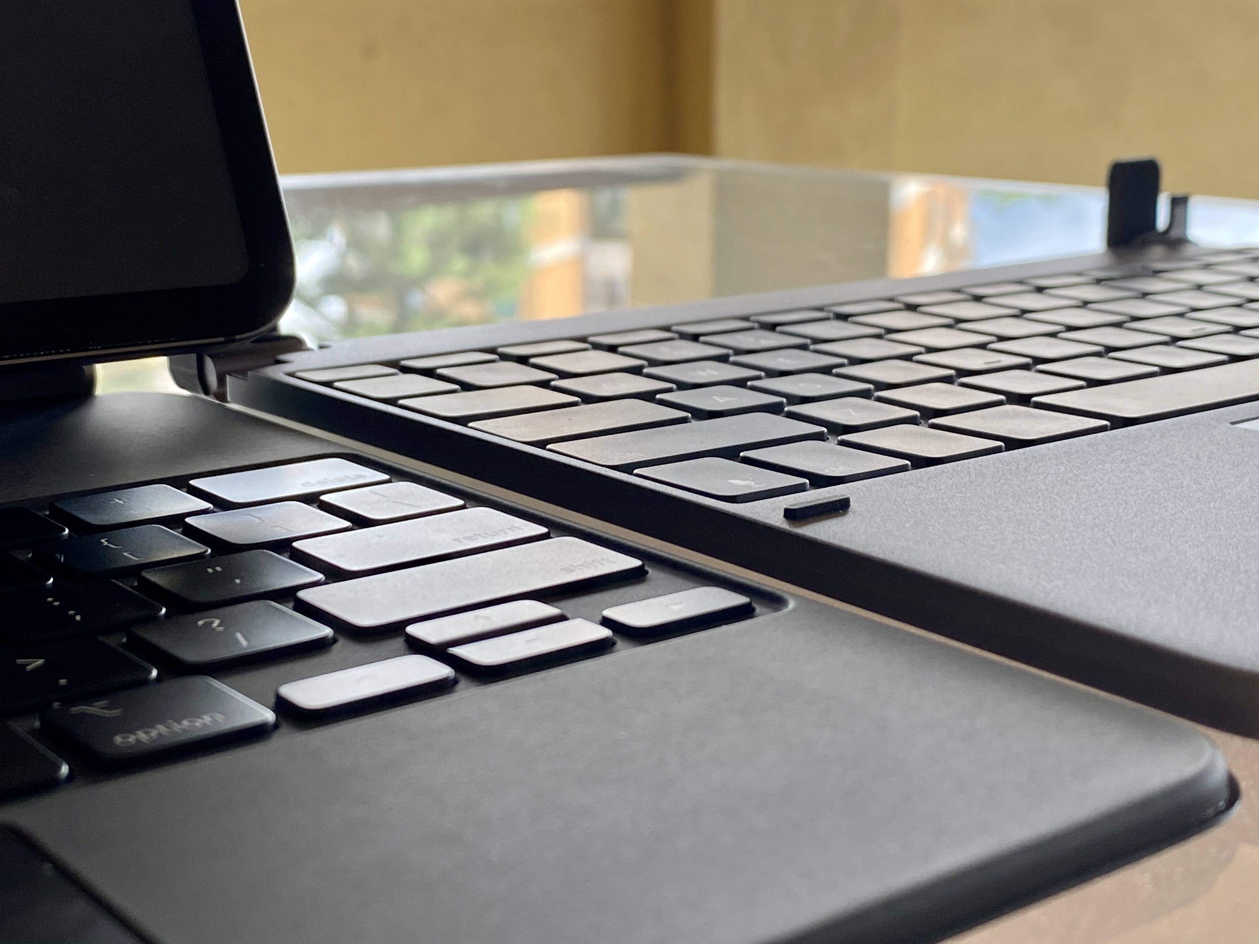 The Magic Keyboard's base is thinner than the Brydge keyboard (right), but Apple's accessory adds thickness by covering the iPad in the back.
